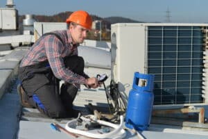technician-refilling-refrigerant-for-an-air-conditioner